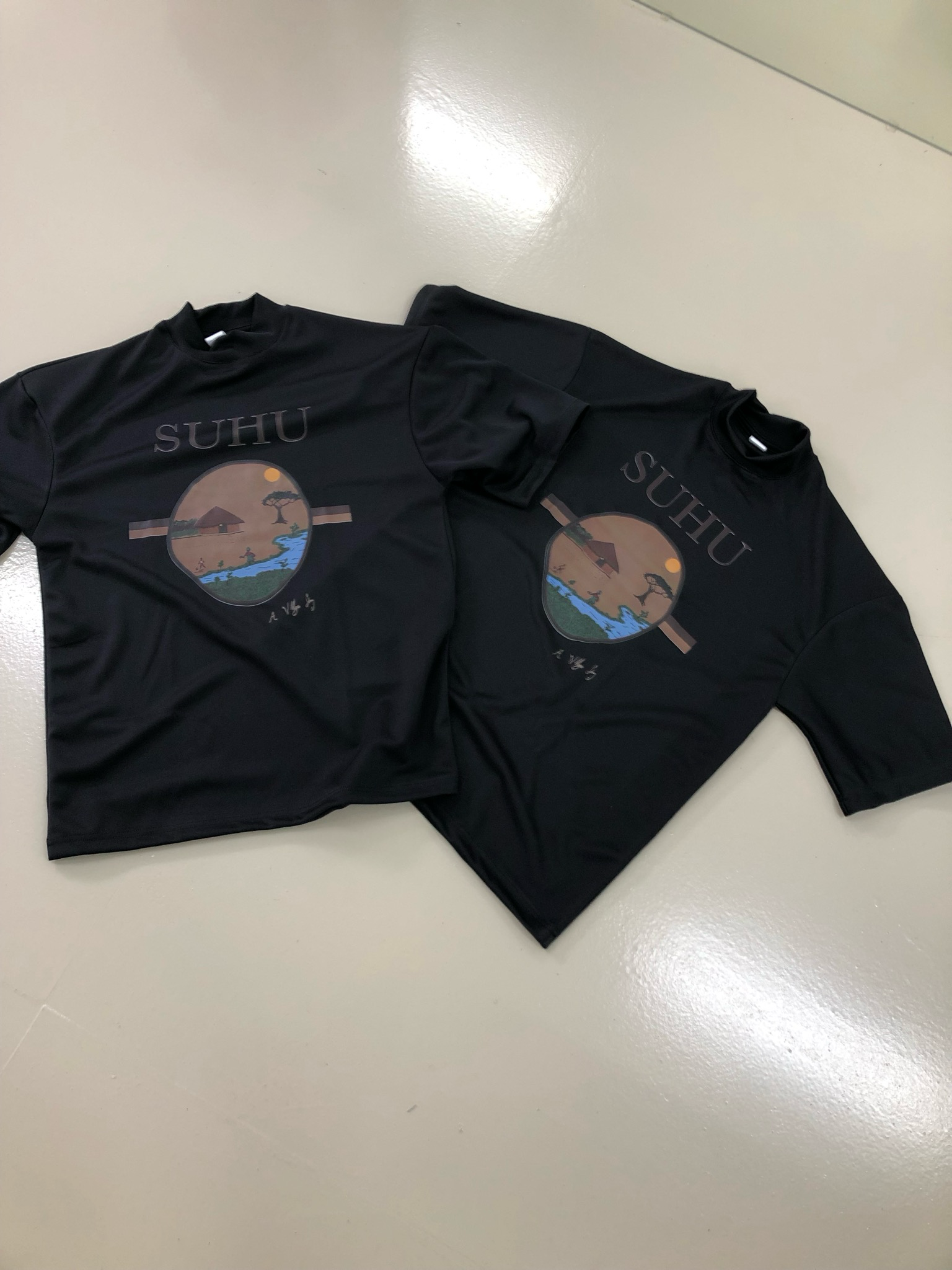 A VILLAGE STORY T-SHIRT BLACK