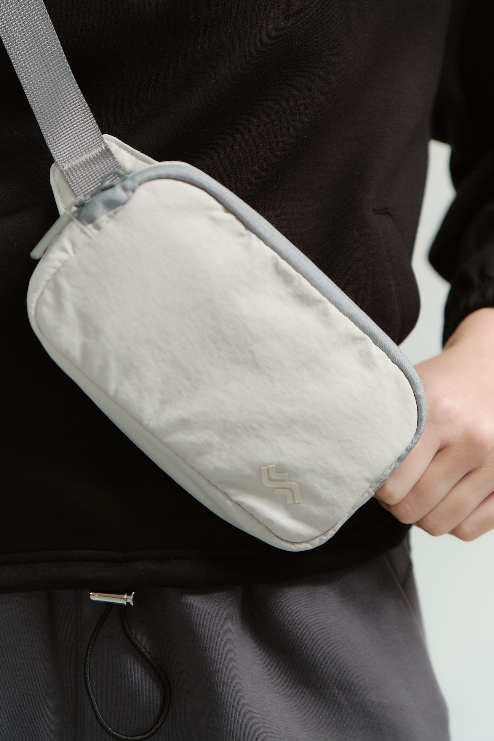 Bend Kit Crossbody Bag