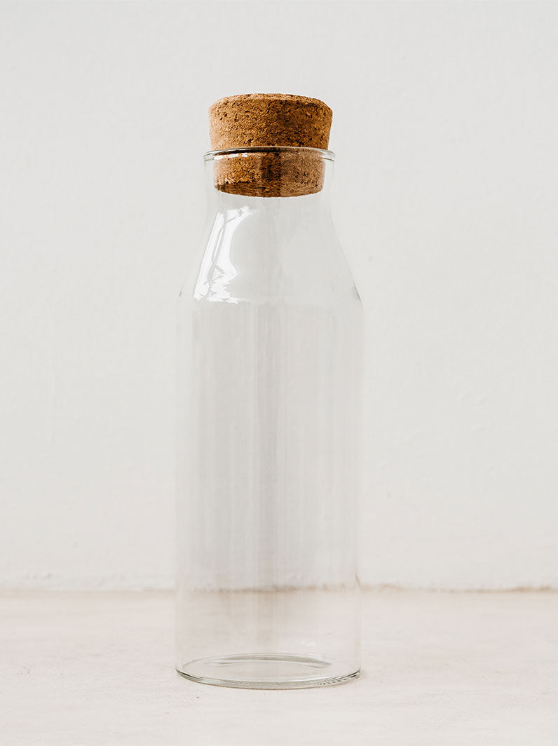 Glass serving water pitcher with cork stopper