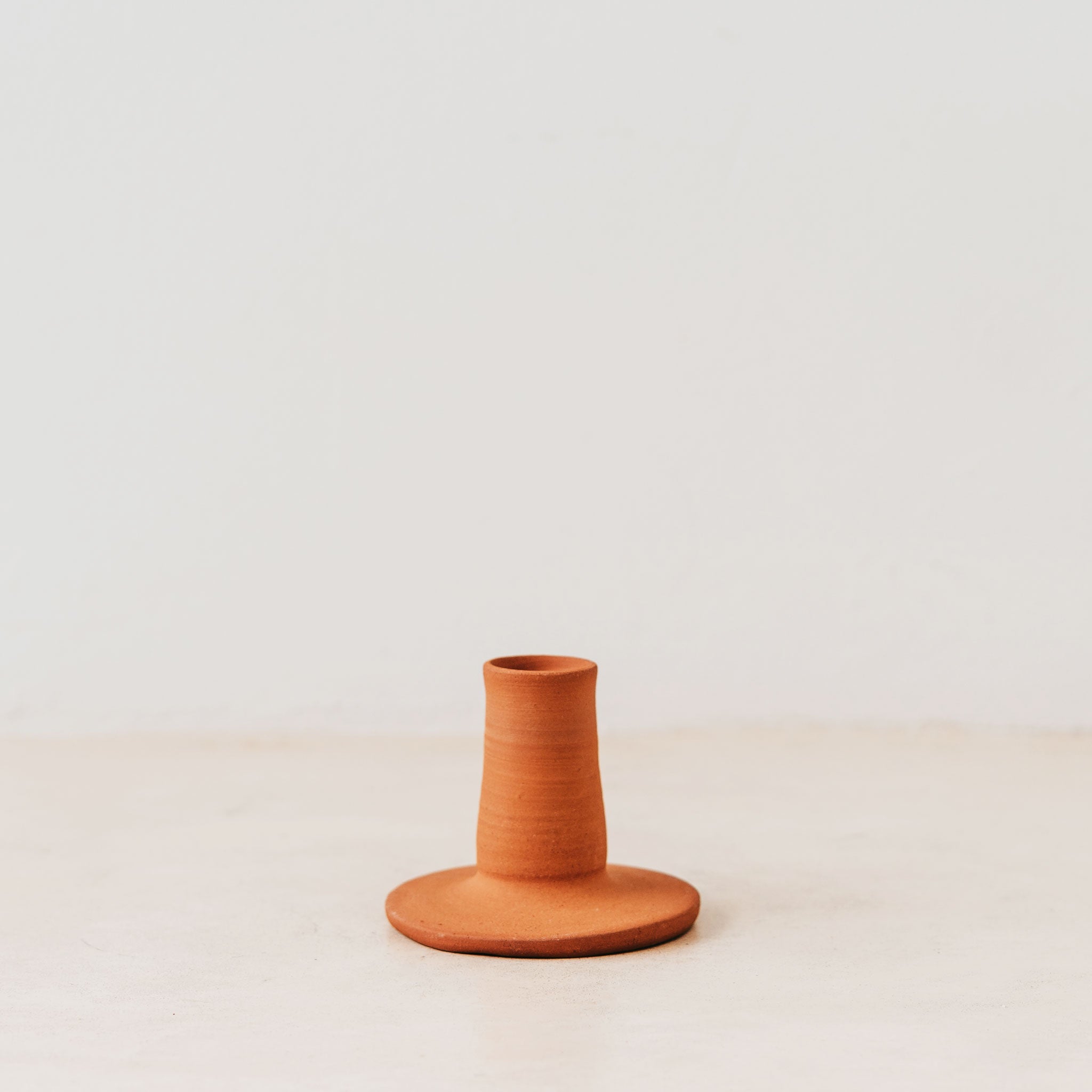 Natural terracotta ceramic candle holder