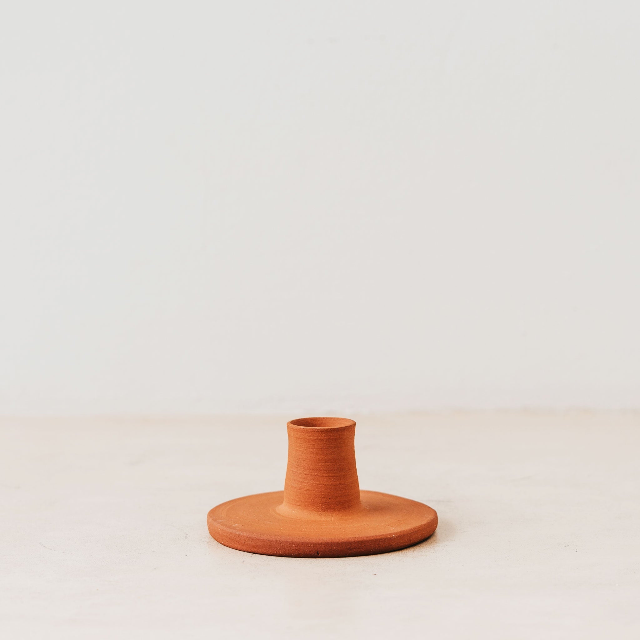 Natural terracotta ceramic candle holder